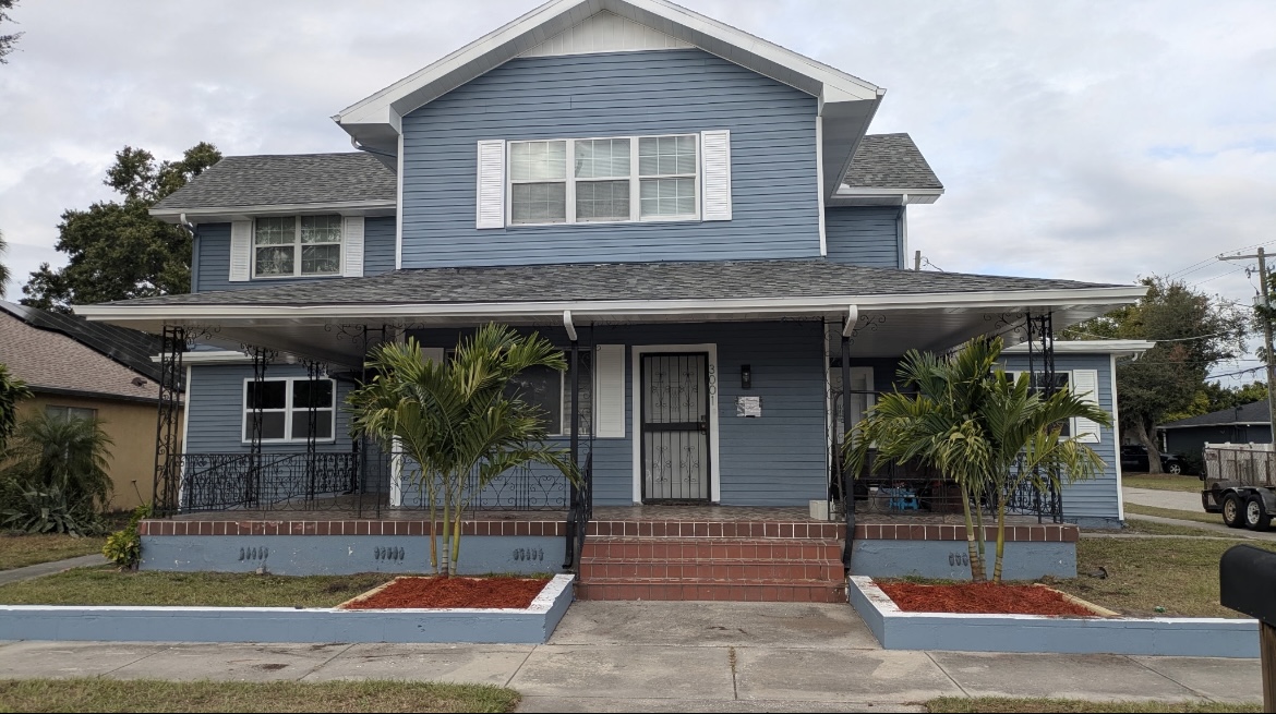 Exterior view of Casa De La Paz - a welcoming, well-maintained residential home with peaceful surroundings